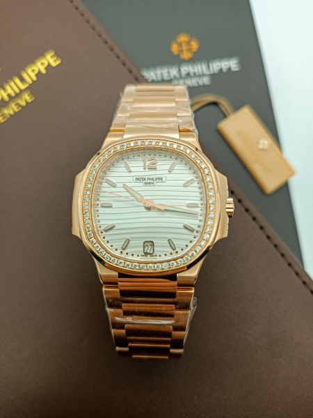 Из золота au750 пробы Patek Philippe Nautilus 7118/1A-010