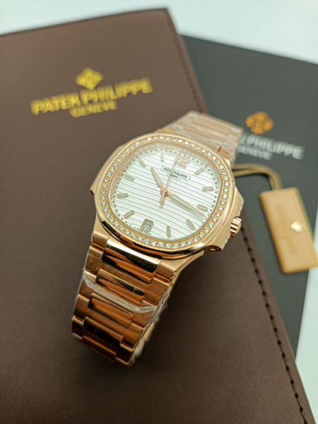 Из золота au750 пробы Patek Philippe Nautilus 7118/1A-010