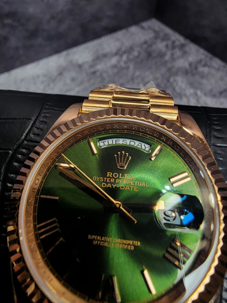Золотые 750 проба Rolex Day-Date 40mm 228235